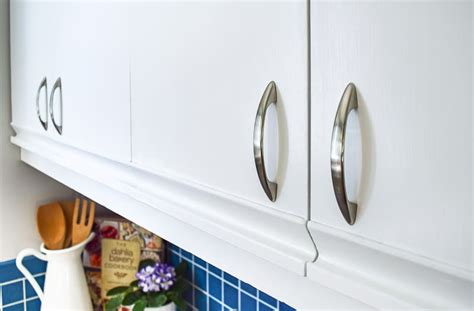 And, yes, susan tells us painting the melamine worked — the brush strokes even look like wood grain, she says. 80s Kitchen Update Reveal - The Handyman's Daughter