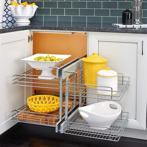 Adding more corner cabinets present a unique challenge for organization since they aren't a perfect square or rectangle. Rev-A-Shelf Blind Corner Cabinet Pull-Out Chrome 2-Tier ...