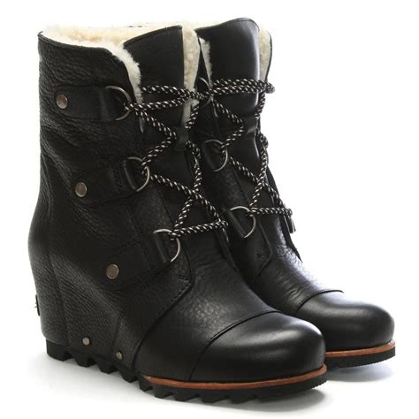 Sorel Joan Of Arctic Black Leather Wedge Boots Lyst