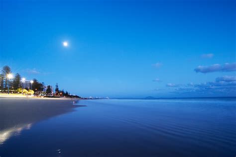 Full Moon At Night On The Beach Stock Photo Download