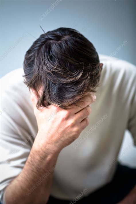 Depressed Man Holding His Head In His Hands Stock Image C0342988