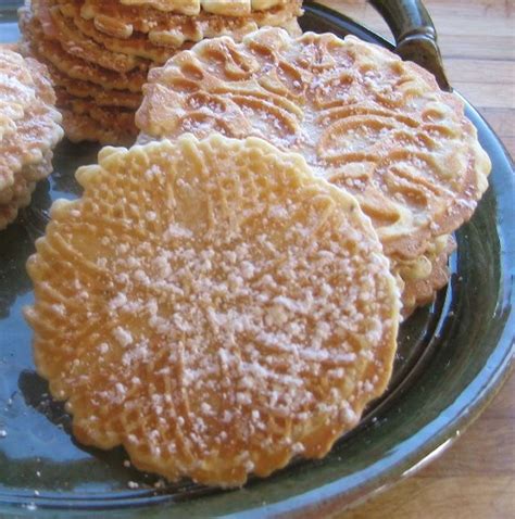 My mother, with the help of us children, made these cookies every december. Christmas cookie experiment finale: Italian pizzelles, ricotta cookies and nut balls ...