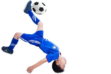 Youth Soccer Player Kicking The Ball Stock Photo Download Image Now