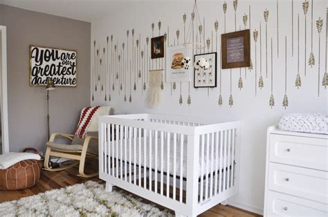 A simple, whitewashed design showcases this neutral nursery's rich wood floors and beamed ceilings, creating a natural balance of dark and light. Tribal Inspired Nursery Decor - Project Nursery