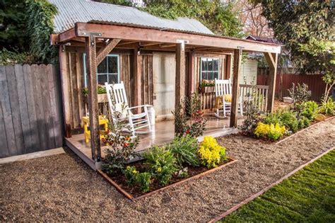 Country Inspired Garden Shed Porch With Rocking Chairs And Metal Roof