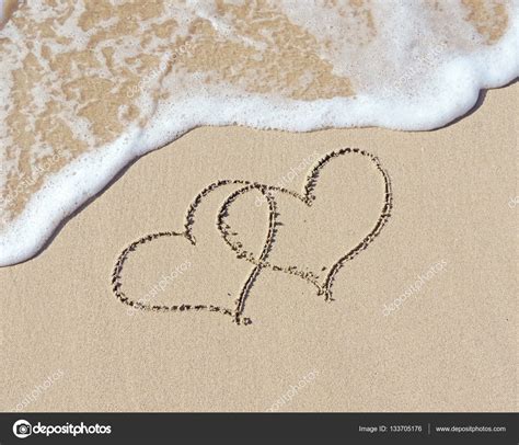Two Hearts In The Sand — Stock Photo © Eivaisla 133705176