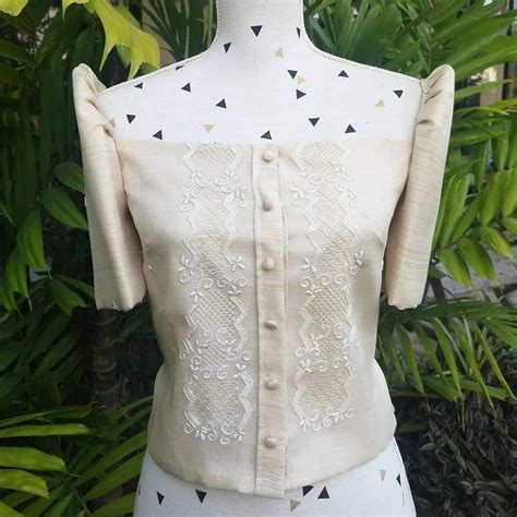 classic but modern filipiniana barong tagala it is made of pinya jusi embroidered fabric this