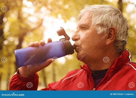 Middle Aged Man Drinking Water After Workout Stock Photo Image Of