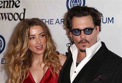 11, 2015 in london, england. Did Johnny Depp hit Amber Heard?