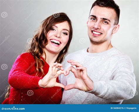 Young Couple Making Heart Shape By Hands Stock Photo Image Of Closeup