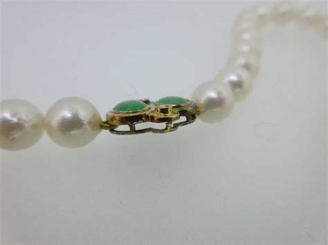 A Cultured Pearl Jade And Diamond Necklace In Cheffins Fine Art