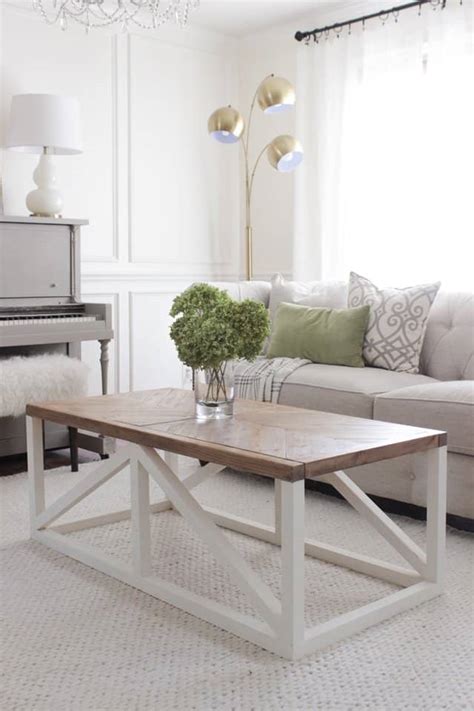 When i started planning this makeover, i knew i wanted to get rid of the glass coffee table i had and go with something more… 30 Easy DIY Farmhouse Coffee Table Projects with Free Plans - Joyful Derivatives