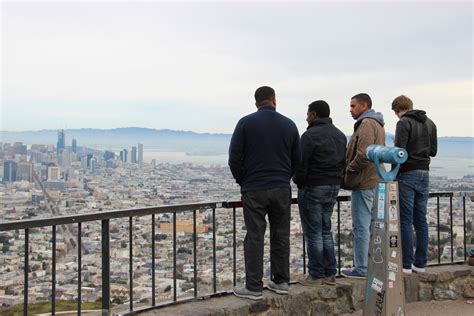 Free Stock Photo Of Men Looking Out Over City
