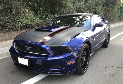 I was more than a year removed from my last experience with the mustang gt and its delicious 5.0 v8 when this new 2014 example rolled up to my driveway the basic formula of the 5.0 has stayed the same for 2014. Deep Impact Blue 2014 Ford Mustang Coupe - MustangAttitude ...