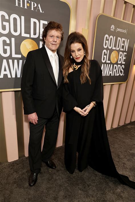 Lisa Marie Presley Gets Dramatic With Cape Dress At Golden Globes 2023 Footwear News