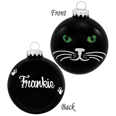 A black cat is a domestic cat with black fur that may be a mixed or specific breed, or a common domestic cat of no particular breed. Personalized Black Cat Face With Green Eyes Glass Ornament