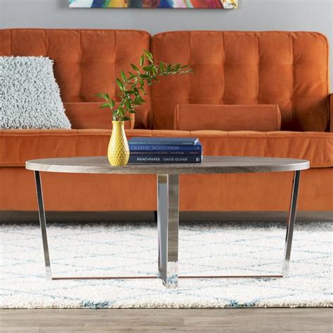 The extended top goes up to serve as a dining table or a workstation. Kailani Coffee Table | Coffee table, Sleek coffee table ...