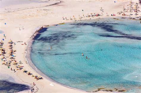 Sunbathing People On Beach Of Balos Lagoone On Crete