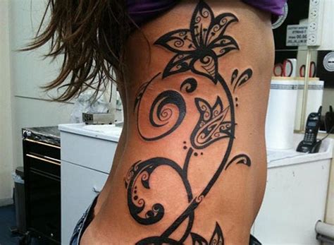 African tribal tattoos for women. 19 Beautiful Tribal Side Tattoos