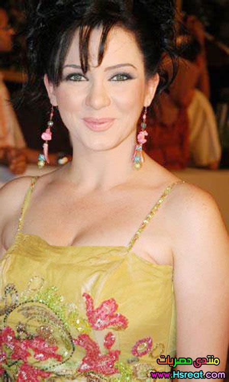 «#سلاف_فواخرجي واولادها حمزة وعلي #ثلج #ثلج #بلودان ☃. سلاف فواخرجي معلومات و صور و السيرة الذاتية