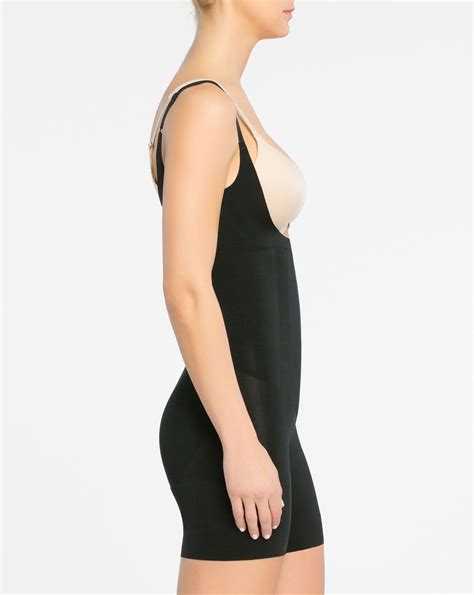 Spanx Oncore Open Bust Mid Thigh Bodysuit In Black Lyst