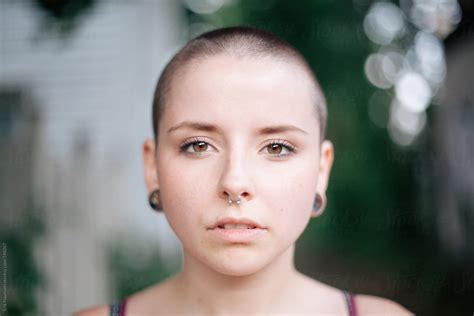 Girl With Shaved Head By Stocksy Contributor Erik Naumann Stocksy