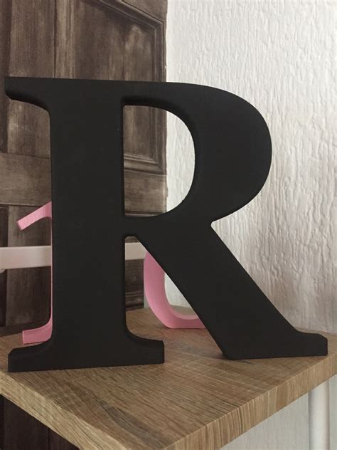 Gravity falls 3 letters back it makes it easier to decode in the cesarian code (think i spelled that right). Black Large Letters Painted Wooden Letters 20cm Large | Etsy