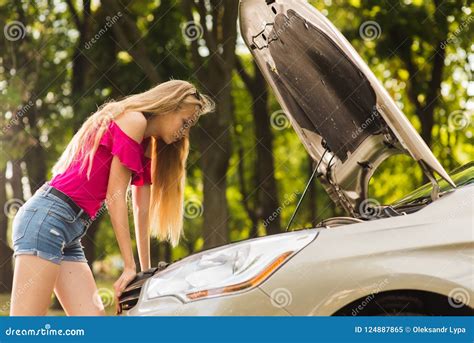 Attractive Girl Look In Open Car Hood Stock Image Image Of Cute