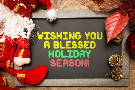 64285491 Wishing You A Blessed Holiday Season Written On Blackboard