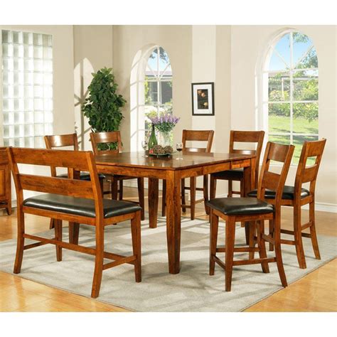 Chic and contemporary with a ski leg iron frame, the clive dining table is crafted from sustainable mango wood and designed to seat 6 or more people. Steve Silver Mango Counter Height 8-Piece Dining Table Set ...