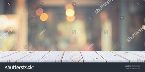 Empty Wood Table White Blurred Background Stock Photo 1751247080