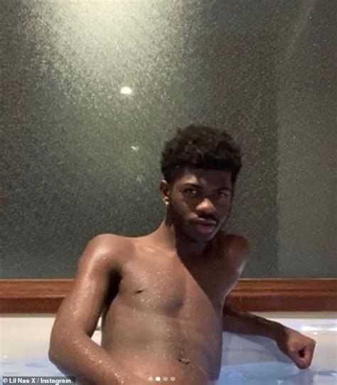 Lil Nas X Goes Shirtless In A Hot Tub For A Series Of Racy Snaps In