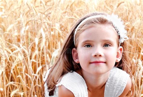 Portrait Of Cute Little Girl On Field Of Wheat Stock Photo Image Of