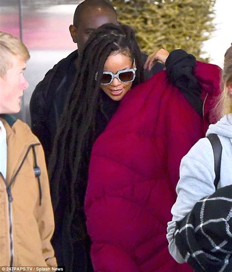 Rihanna Shows Off Dreadlocks After Flying Back To New York From Paris