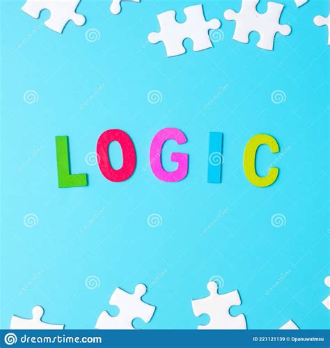 Logic Text With White Puzzle Jigsaw Pieces On Blue Background Concepts