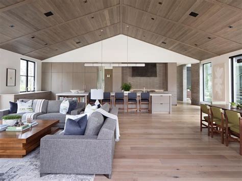 A Wood Ceiling Adds Warmth Inside This Modern Farmhouse Open Concept