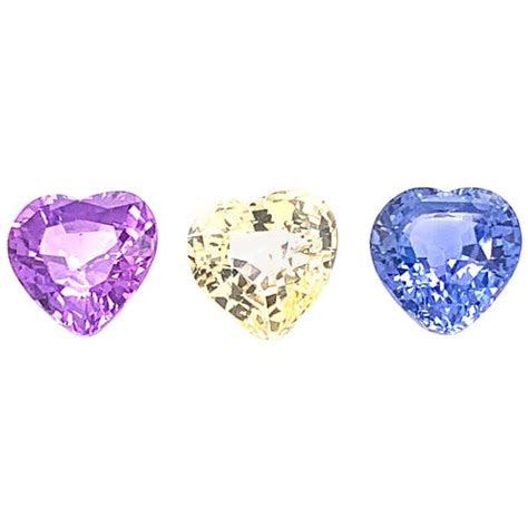 722 Carat Heart Shaped Unheated Blue Pink And Yellow Sapphire Trio