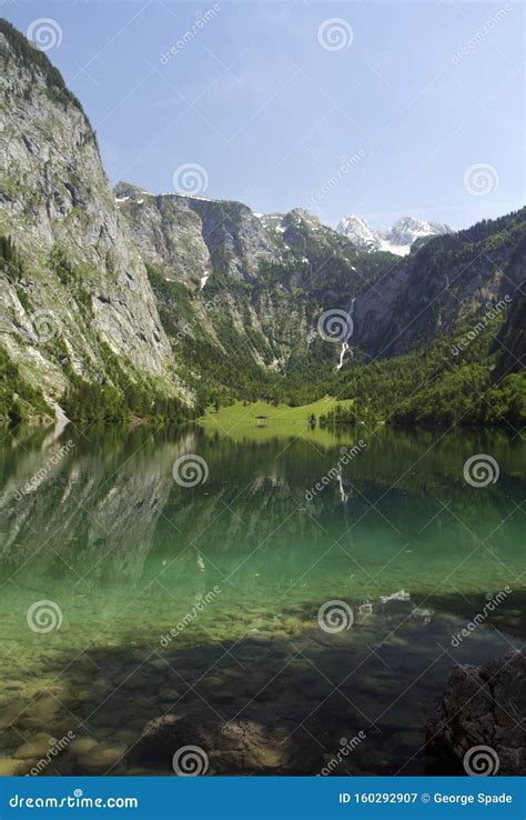 Lake Und Waterfall In Alps Mountain Stock Image Image Of Coast Alps