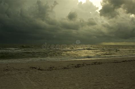 Swirling Storm Clouds Over Gulf Of Mexico With Crashing Waves Stock