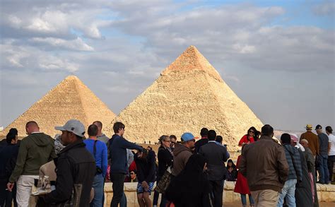 In Pictures Tourists Return To Egypt S Pyramids After Giza Bus Attack Arabianbusiness