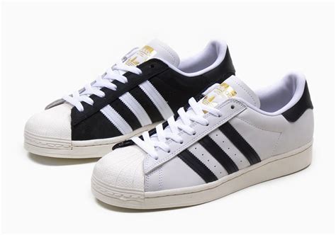 The Iconic White And Black Adidas Superstar Combine Into One Split
