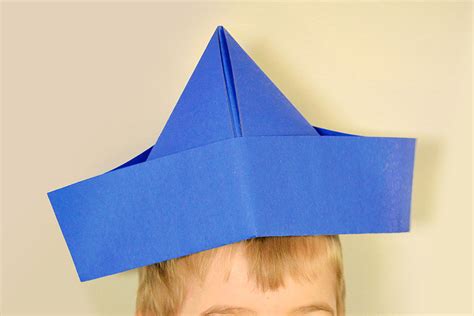 Paper hats are so simple to make and really fun to wear! How to Make a Paper Hat | An Easy Paper Hat Tutorial - One ...