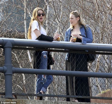 Amber Heard Takes The 90s Trend Too Far With Slashed Jeans In Ny Daily Mail Online