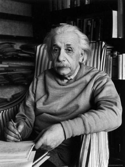 Famed Scientist Albert Einstein In His Study At Home Premium