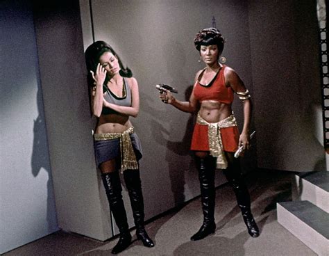A Fun Pose With Lieutenant Uhura Holding At Phaser Point Marlena Moreau In The Mirror Universe