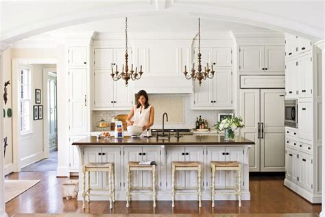 The before photos of the kitchen show the worn flooring and countertops, aging appliances, and the cabinets with very prominent grain. Creamy White Cabinets - Crisp & Classic White Kitchen ...