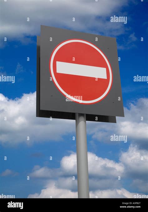 Circular Red And White Road Traffic No Entry Sign Against Blue Sky