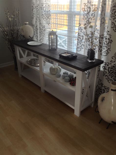 A pretty gray set of cabinets, painted smooth, will draw the eyes to the other rustic features in your home rather than taking the attention themselves. Rustic X Console Table | Do It Yourself Home Projects from ...