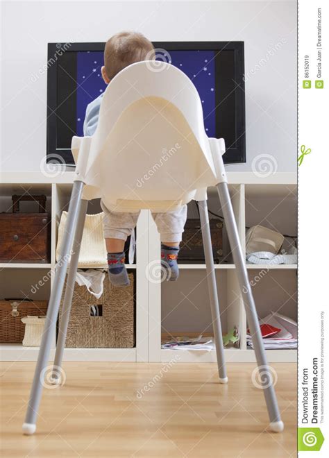 Baby Boy Watching Cartoons On Tv Stock Image Image Of Shelves Watch