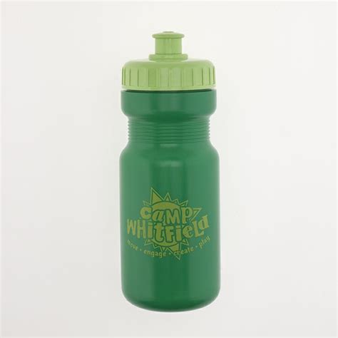 A Green Water Bottle With The Word Camp Whitefield Printed On Its Side